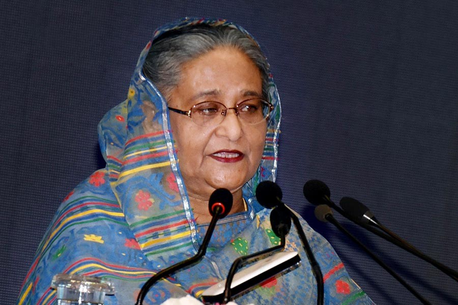 Prime Minister Sheikh Hasina addressing a function at Bangabandhu International Conference Centre (BICC) on Tuesday over inauguration of two satellite ground stations. -Focus Bangla Photo