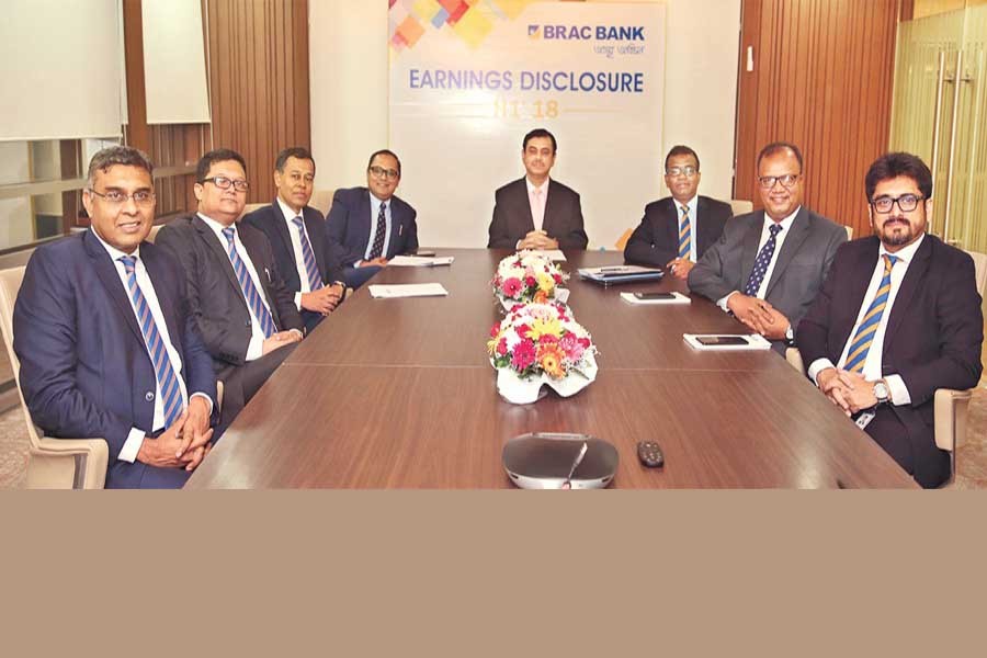 Managing Director & CEO of BRAC Bank Limited Selim R. F. Hussain and the bank's senior executives seen at the half-yearly financial results announcement programme in the capital on Wednesday