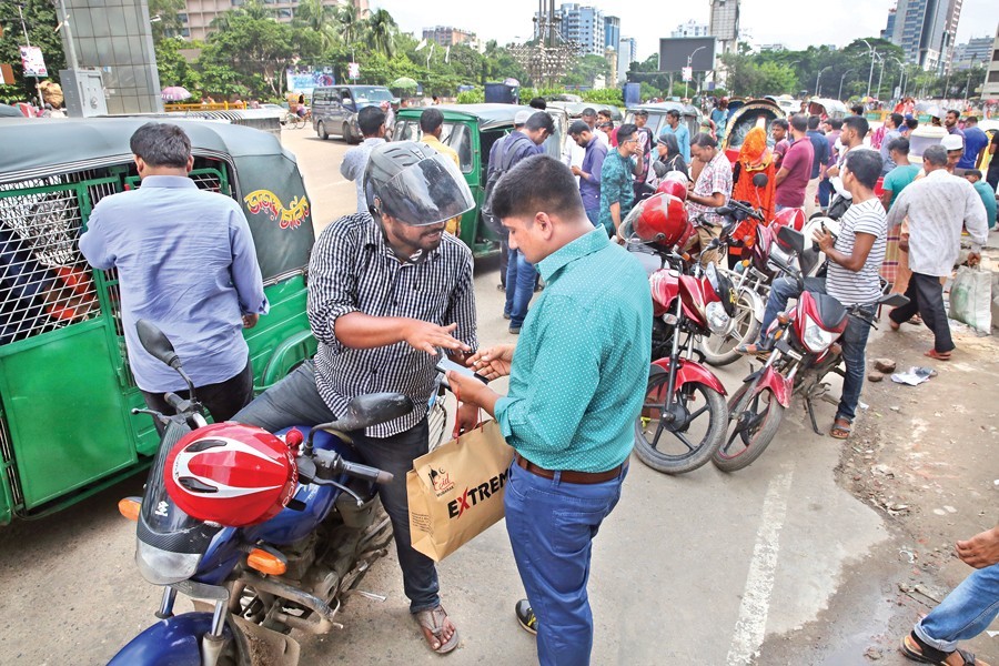 App-based ride-sharing service is in great demand amid the ongoing student movement in the capital. The photo was shot in Karwanbazar area on Friday. — FE Photo