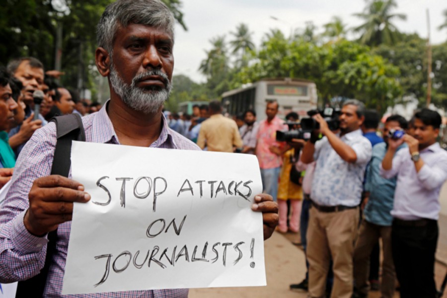 Bangladeshi photojournalists, journalists, and journalism students protest against recent attacks on journalists, in, Dhaka, Bangladesh, August 7, 2018. Photo: Collected