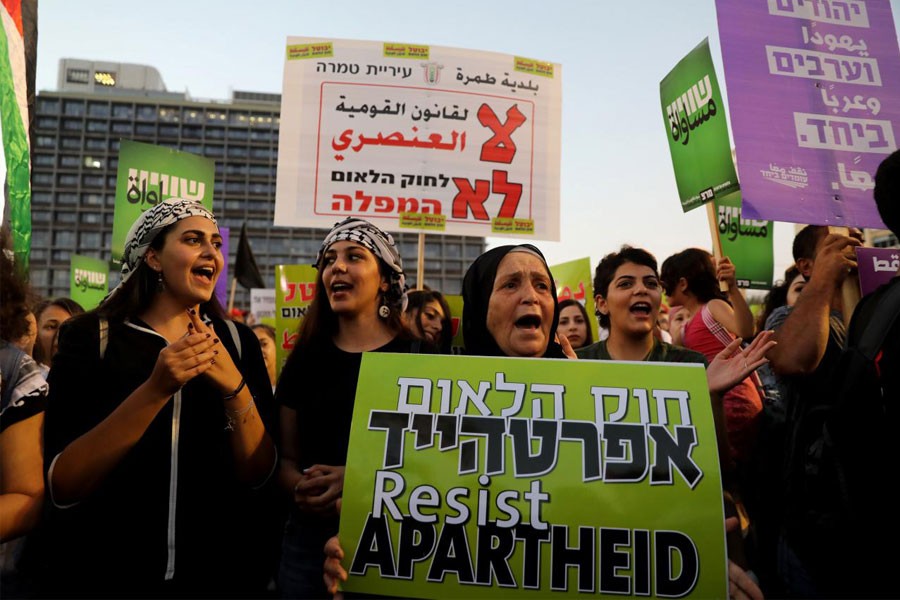 Israeli Arabs and their supporters take part in a rally to protest against Jewish nation-state law in Rabin square in Tel Aviv, Israel August 11, 2018 – Reuters