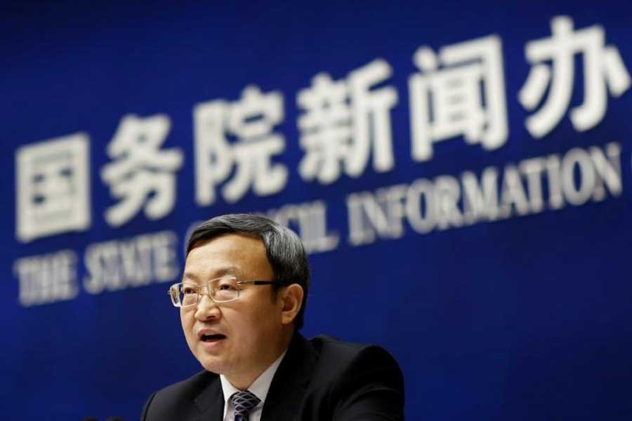 Chinese Vice Commerce Minister and Deputy China International Trade Representative Wang Shouwen attends a news conference in Beijing, China, April 4, 2018. Reuters/Files