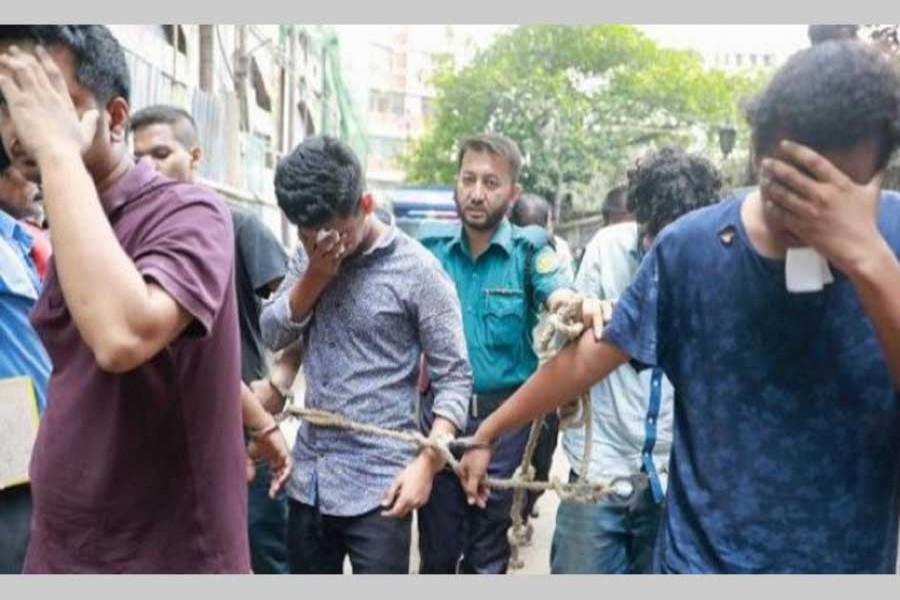 A file photo shows police taking students arrested during recent protests to a Dhaka court. Photo/Coillected