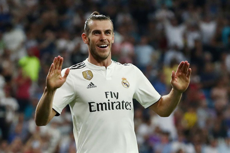 Soccer Football - La Liga Santander - Real Madrid vs Getafe - Santiago Bernabeu, Madrid, Spain - August 19, 2018 Real Madrid's Gareth Bale celebrates scoring their second goal – Reuters