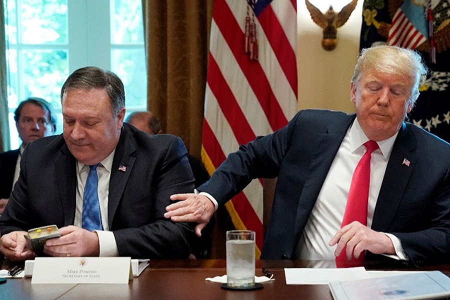 US President Donald Trump (R) and US Secretary of State Mike Pompeo seen in this undated Reuters photo