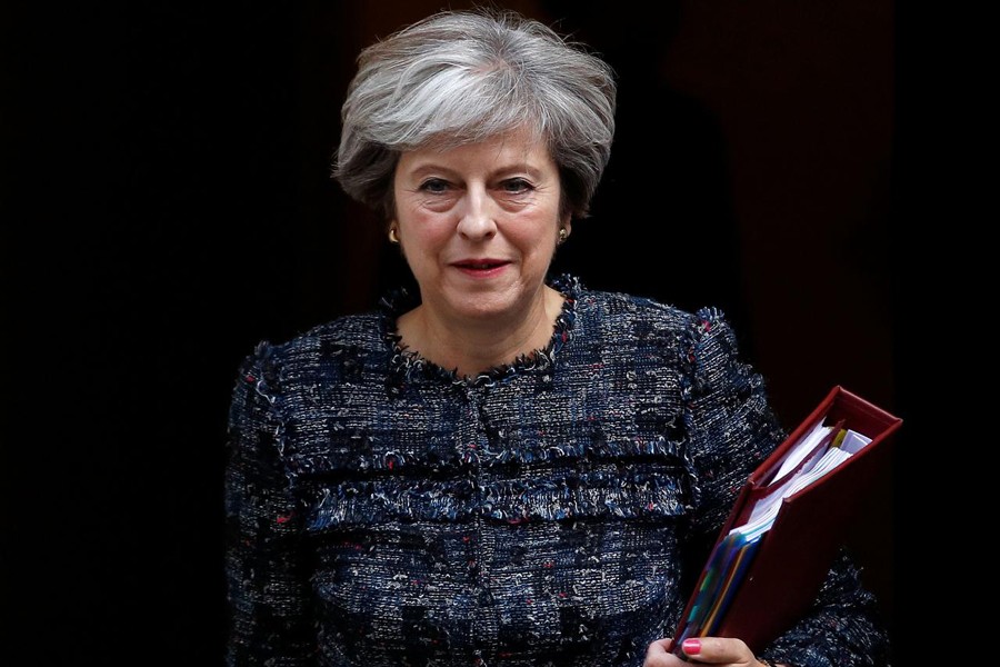 Britain's Prime Minister Theresa May leaves 10 Downing Street to attend Prime Minister's Questions, in London, September 13, 2017. Reuters/File photo