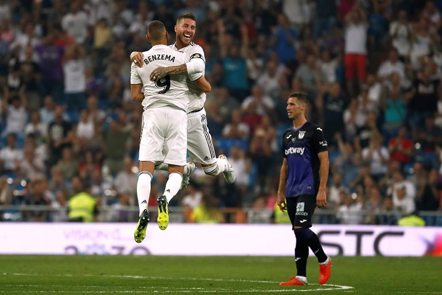 Real's Benzema celebrates with captain Ramos as they seal victory against Leganes — Reuters photo