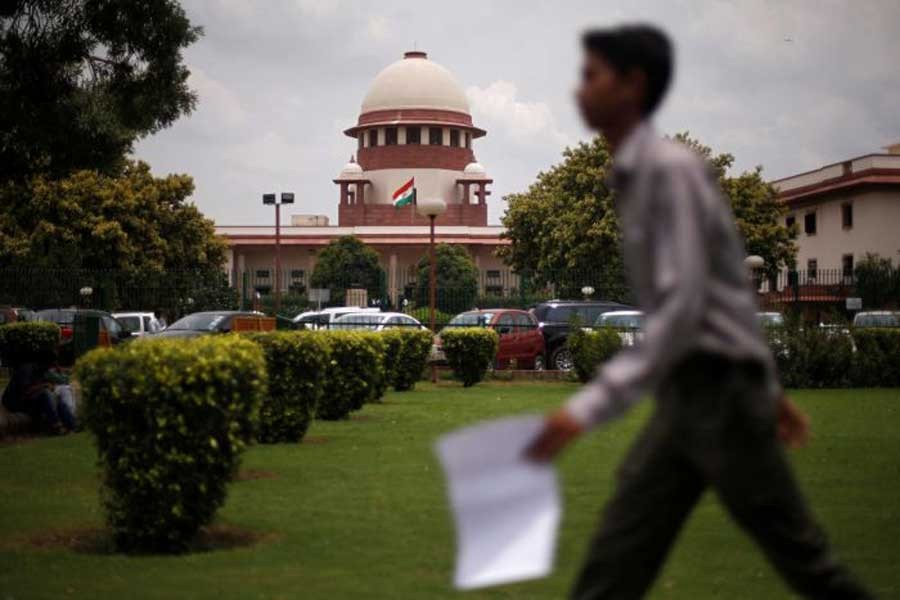 A man walks inside the premises of the Supreme Court in New Delhi, India, July 17, 2018. Reuters/Files