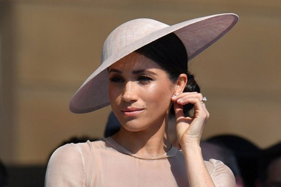 Meghan, Duchess of Sussex attends a garden party at Buckingham Palace, in London, Britain May 22, 2018. Dominic Lipinski/Pool via Reuters