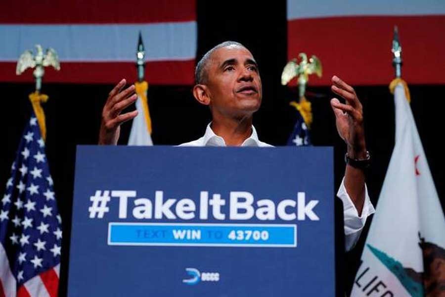 Obama takes swipe at Trump in political rally