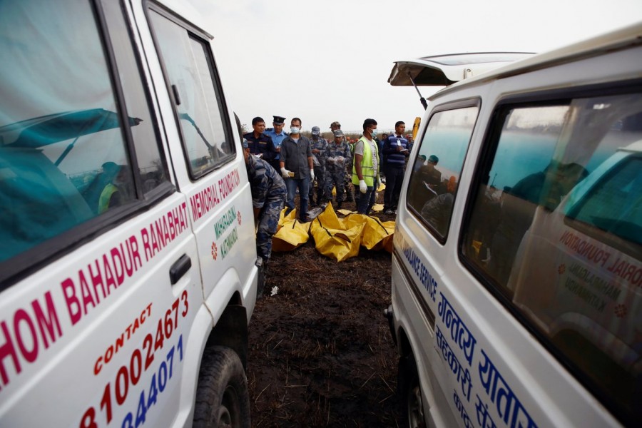 Rescue workers work at the wreckage of a US-Bangla airplane after it crashed at the Tribhuvan International Airport in Kathmandu, Nepal on March 12 last — Reuters/File