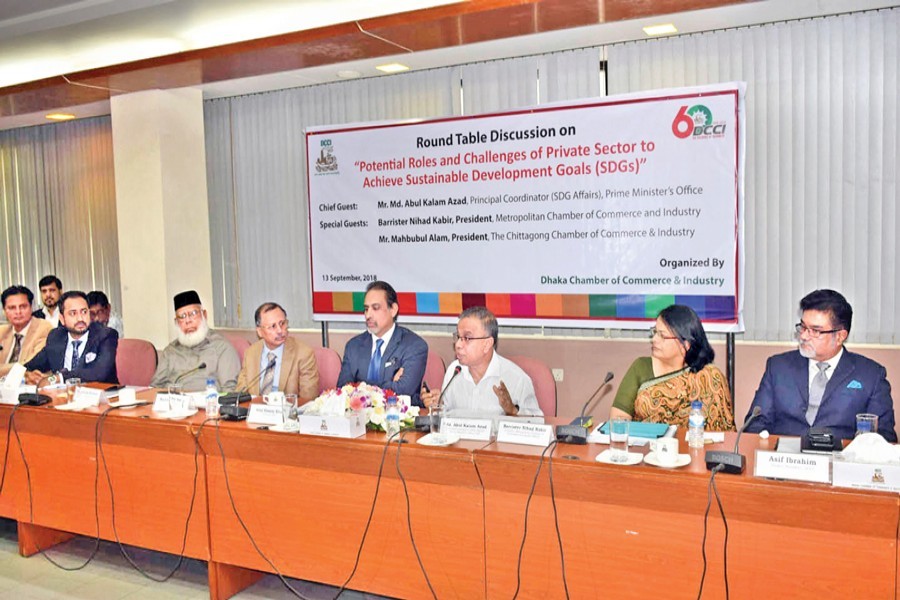 ICC Bangladesh President Mahbubur Rahman and others seen at a roundtable discussion on "Potential Roles and Challenges of Private Sector to Achieve Sustainable Development Goals (SDGs)" organised by DCCI in the city on Thursday