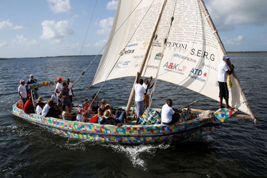 People take part in the first voyage sail of Flipflopi, the first dhow boat made entirely of recycled plastic, after the launch ceremony on the island of Lamu, Kenya, September 15, 2018. Reuters photo