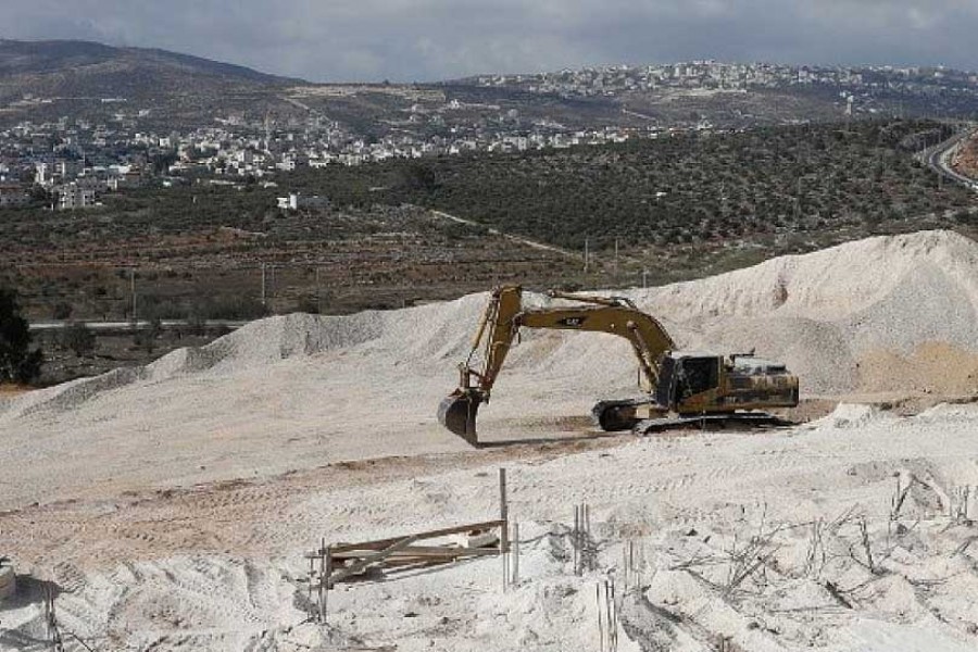 A CRANE IS USED AT THE CONSTRUCTION SITE IN THE WEST BANK SETTLEMENT OF AMICHAI ON SEPTEMBER 07, 2018:  25 years on, some Israeli right-wingers ready to declare Oslo accords dead. With settlers strengthening their hold on the West Bank and no prospects of peace on the horizon.	 —AFP