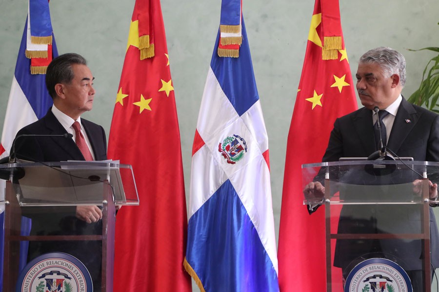 China's Foreign Minister Wang Yi and Dominican Republic's Chancellor Miguel Vargas address the media after signing a bilateral agreement in Santo Domingo, Dominican Republic September 21, 2018 – Reuters