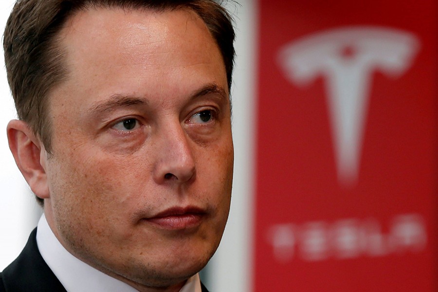 Tesla Motors' Chief Executive Elon Musk pauses during a news conference in Tokyo, Japan on September 8, 2014 — Reuters/File