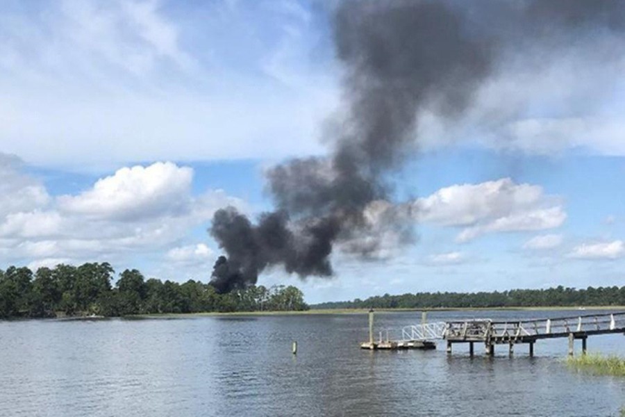 Smoke rises at the site of a F-35 jet crash. Reuters photo