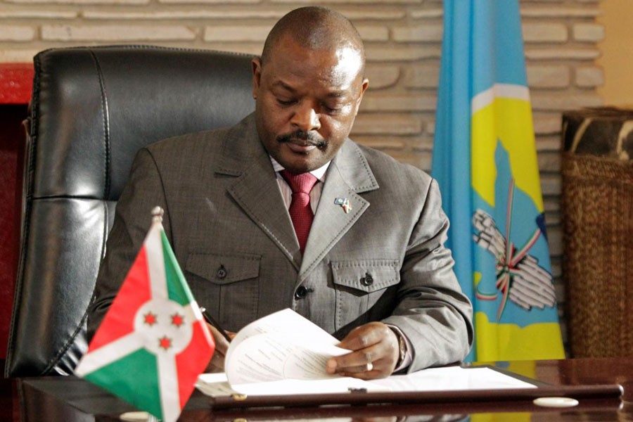 Burundi's President Pierre Nkurunziza signs the new constitution at the presidential palace in Gitega Province, Burundi June 7, 2018 - Reuters file photo