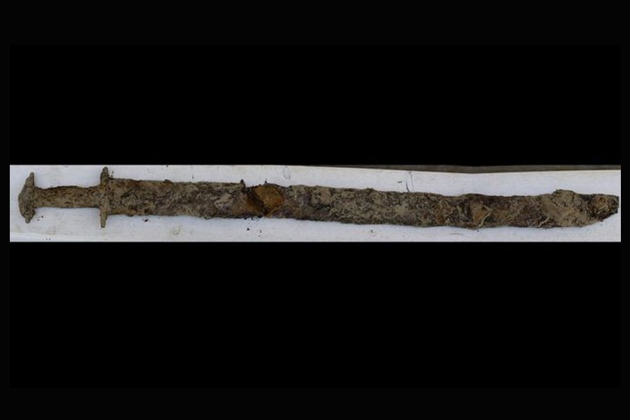 Girl pulls 1,500-year-old sword from a lake