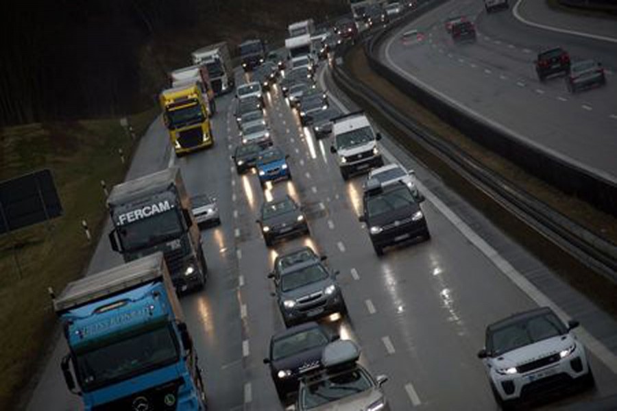 Cars and trucks are stuck in a traffic jam near Irschenberg, Germany, March 29, 2018. Reuters/Files