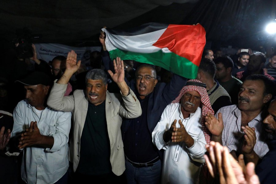 People celebrate after Israel delays eviction of the Palestinian Bedouin village of Khan al-Ahmar, in the occupied West Bank October 20, 2018. Reuters