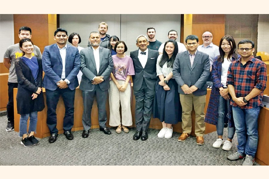 Managing Director and Chief Executive Officer (CEO) of Standard Bank Limited Mamun-Ur-Rashid in a photo session with the students of Hitotsubashi University and Hosei University and others at a seminar on 'Innovation for Growth and Development in the Developing Countries', organised for the students of GMBA Programme of the two Japanese varsities recently