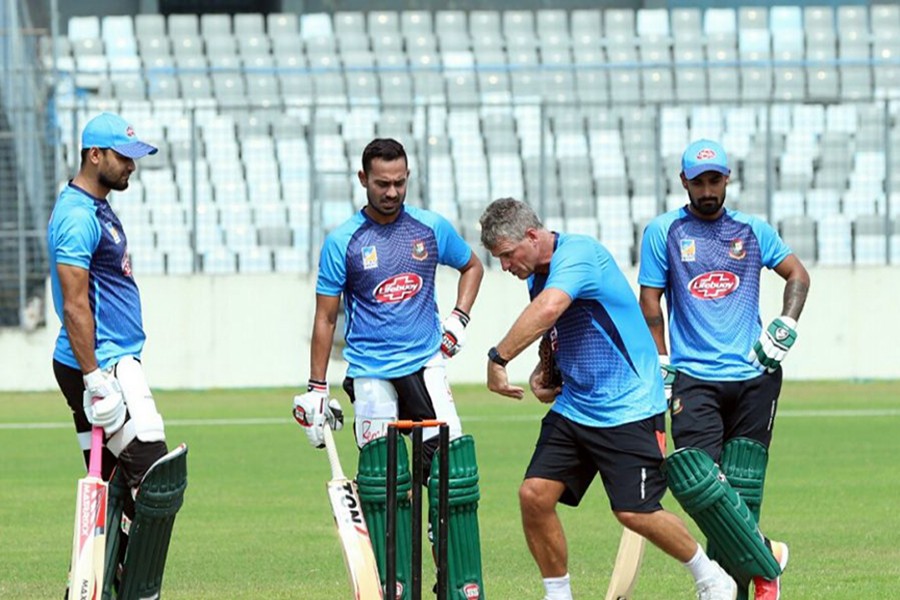 Bangladesh cricket team coach Steve Rhodes seen talking to cricketers during a training session in this file photo. Courtesy: BCB