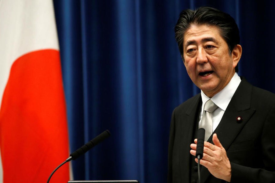 Japan's Prime Minister Shinzo Abe attends a news conference after reshuffling his cabinet, at his official residence in Tokyo, Japan, August 3, 2017 - Reuters file photo