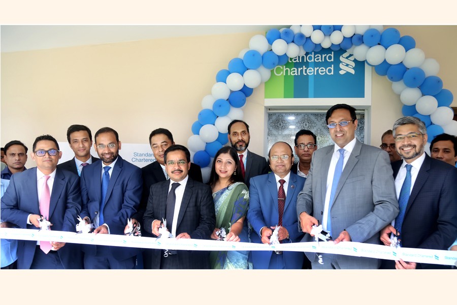 A view of the opening ceremony of the business development office of Standard Chartered Bangladesh at Uttara EPZ in Nilphamari on Monday