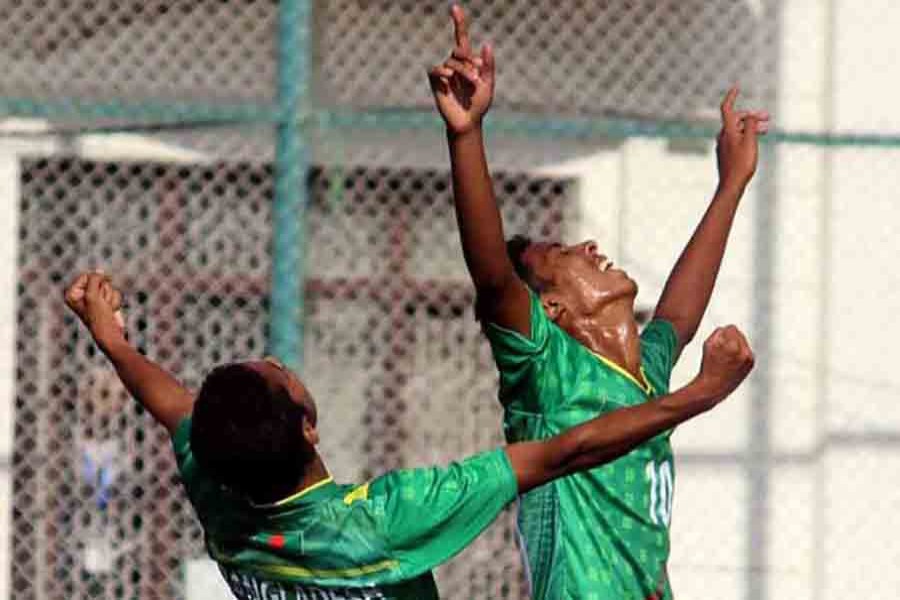 Bangladesh’s four goal hero Nihat Jaman Ucchash (R) celebrates against Maldives in Kathmandu, Nepal. BFF file photo