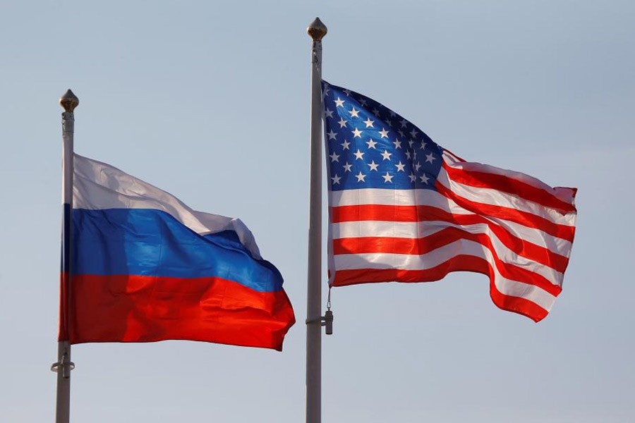 National flags of Russia and the US fly at Vnukovo International Airport in Moscow, Russia April 11, 2017 – Reuters