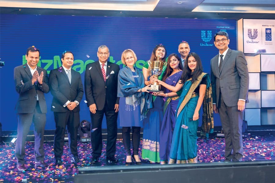 Students of BUP after receiving the trophy and ticket to the global round from the guests—CEO and Managing Director of Unilever Bangladesh Limited Kedar Lele, UN Resident Coordinator  and  UNDP Resident Representative, Bangladesh Mia Seppo and others