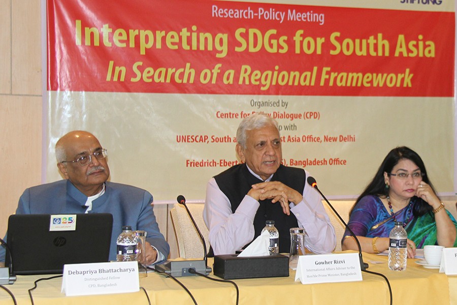 International Affairs Adviser to the Prime Minister Gowher Rizvi speaking at a research-policy meeting on 'Interpreting SDGs for South Asia: In Search of a Regional Framework' organised by Centre for Policy Dialogue at a city hotel on Tuesday — FE photo