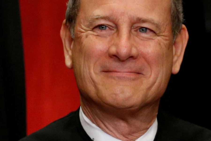 US Chief Justice John Roberts participates in taking a new family photo with his fellow justices at the Supreme Court building in Washington, DC, US, June 1, 2017. Reuters/File Photo