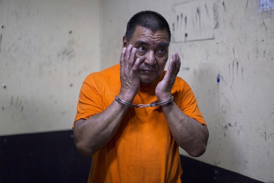 In this Aug 10, 2016 file photo, Santos Lopez Alonzo stands in a courtroom as he waits for his first hearing in Guatemala City. Photo: AP