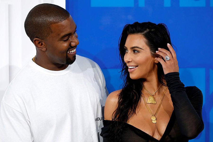 Kim Kardashian and Kanye West arrive at the 2016 MTV Video Music Awards in New York, US, August 28, 2016. Reuters/File photo