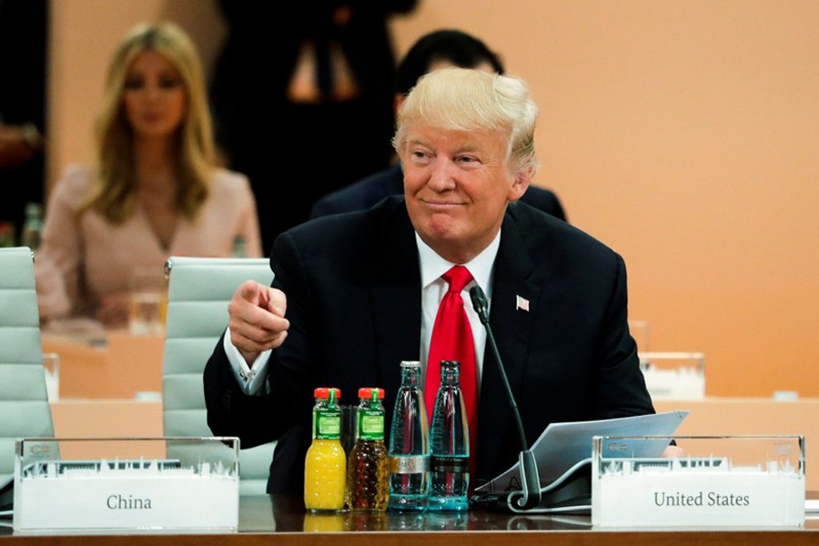 US President Donald Trump attends a working session at the G-20 summit in Hamburg, northern Germany, Saturday, July 8, 2017.Reuters/Files