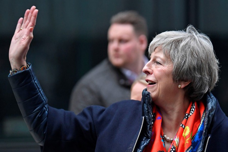 Britain's Prime Minister Theresa May leaves the BBC, after taking part in a live radio phone-in, in central London, Britain, November 23, 2018. Reuters