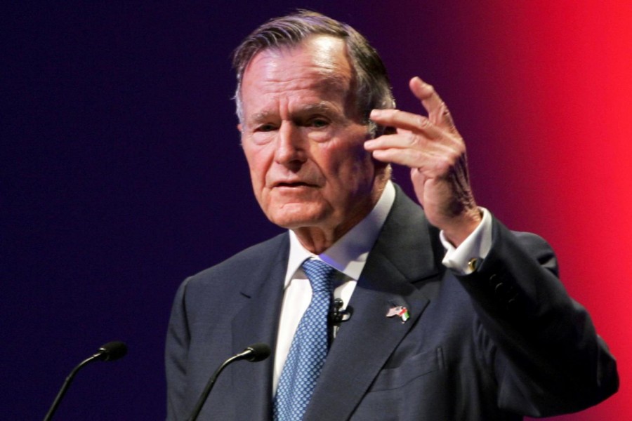 Former US President George H W Bush speaks at the World Leadership Summit in Abu Dhabi, United Arab Emirates November 21, 2006 - REUTERS/Stringer/File Photo