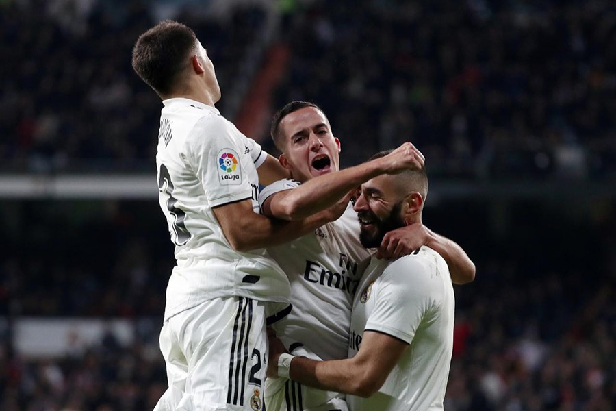 Real Madrid's Vazquez and others celebrate their second goal against Valencia — Reuters photo