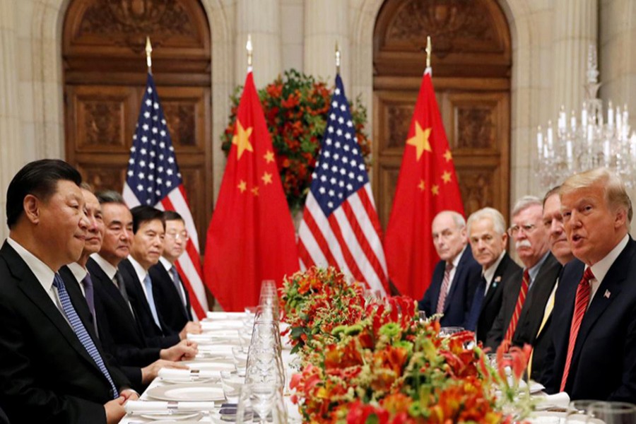 US President Donald Trump and Chinese President Xi Jinping attend a working dinner after the G20 leaders summit in Buenos Aires, Argentina, December 1, 2018. Reuters