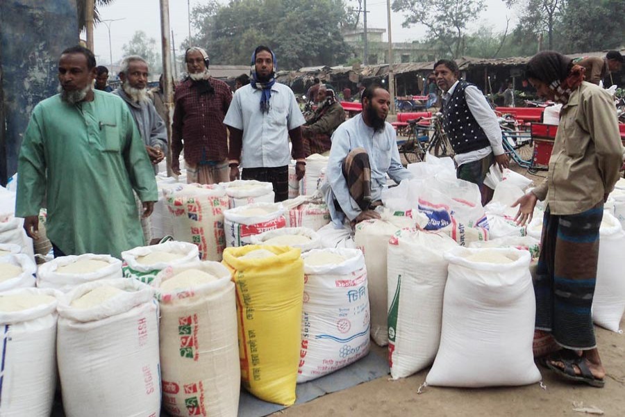 A view of a wholesale rice market in Singra upazila of Natore   	— FE Photo