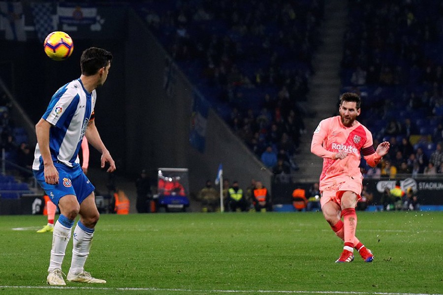 Soccer Football - La Liga Santander - Espanyol v FC Barcelona - RCDE Stadium, Barcelona, Spain - December 8, 2018 Barcelona's Lionel Messi scores their fourth goal - REUTERS/Albert Gea