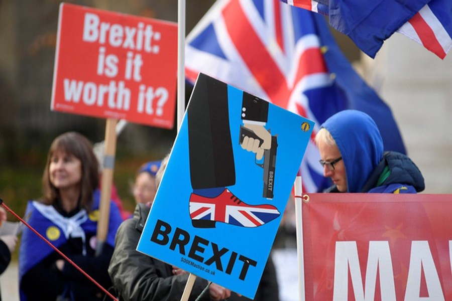 Anti-Brexit protesters hold posters and flags in Whitehall, in central London, Britain, December 6, 2018. Reuters