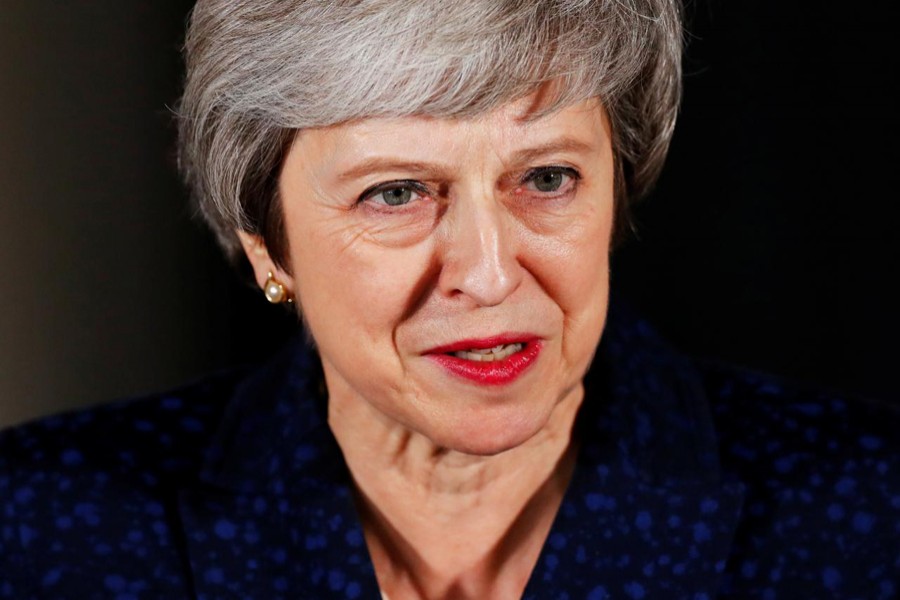 Britain's Prime Minister Theresa May speaks outside 10 Downing Street after a confidence vote by Conservative Party Members of Parliament (MPs), in London, Britain, December 12, 2018. Reuters