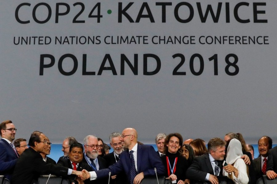 Nations agree global climate pact rules, set aside political divisions