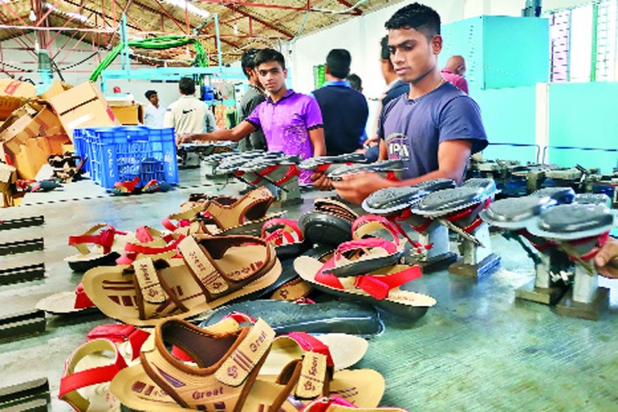 Workers making footwear at a factory in Bhairab — FE Photo