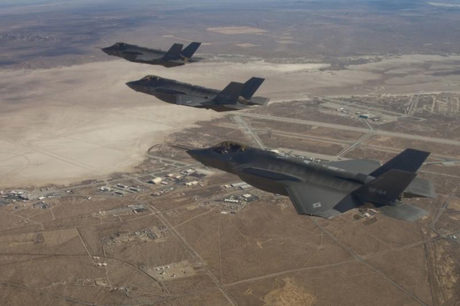 Three F-35 Joint Strike Fighters can be seen flying over Edwards Air Force Base in this December 10, 2011 handout photo provided by Lockheed Martin. Reuters/File