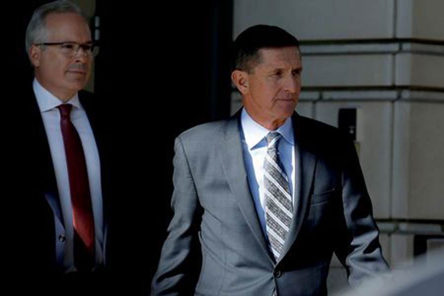 Former US National Security Adviser Michael Flynn departs after a plea hearing at U.S. District Court, in Washington, US, December 1, 2017. Reuters/File Photo