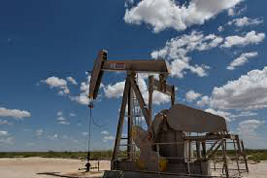 A pump jack operating in the Permian Basin oil production area near Wink, Texas US 	— Reuters